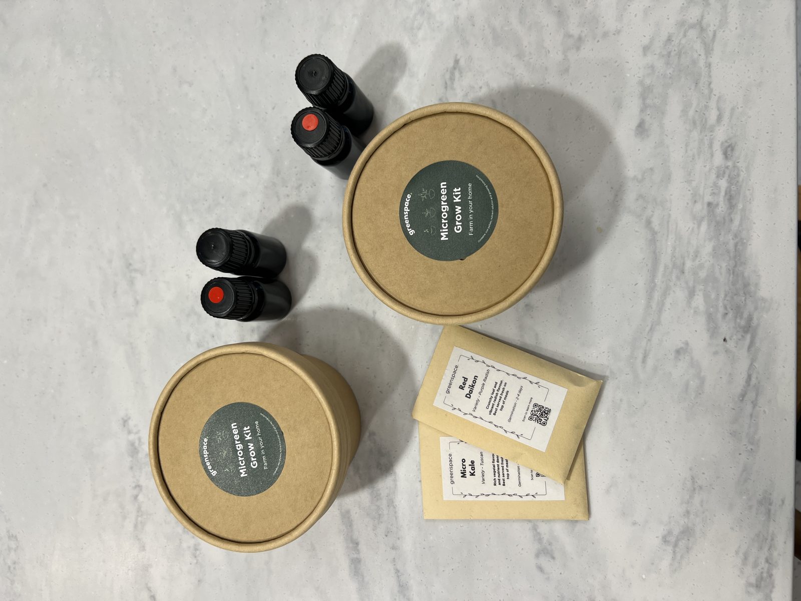 Corporate Urban Farmers grow kit: compostable pot, growing medium, nutrient solution and seed packets